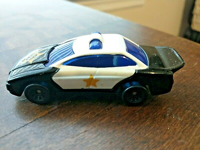 #ad Black and White with Gold Star Hot Wheels Police Car 1993 G4 $2.95