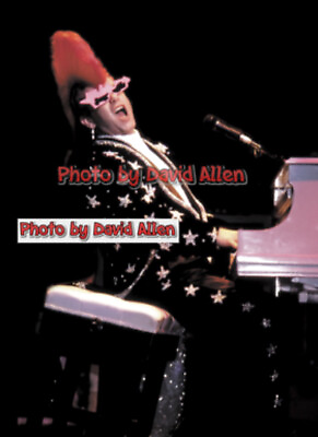 ELTON JOHN AT MADISON SQUARE GARDEN 16”X20” PHOTO SIGNED BY PHOTOG LIMITED # $300.00