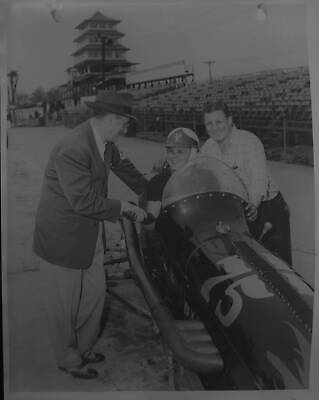 #ad Gene Hartley sits in the #75 Troy Oil Special as he talks to a 1950 Indy Photo AU $9.00