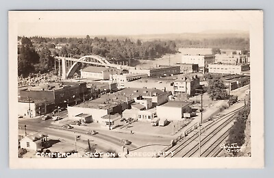 #ad Postcard RPPC Commercial Section of Oregon City Oregon Arch Bridge Mobil Gas $7.90